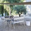 Fermob Luxembourg dining set with benches and chairs in clay grey.