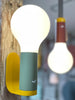 Aplo lights showing hanging and wall mount with mixed colors.